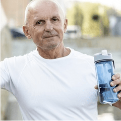 Man smiling with water bottle