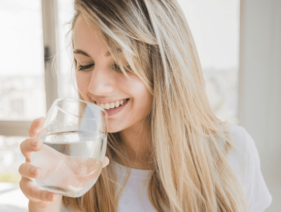 Woman sipping water